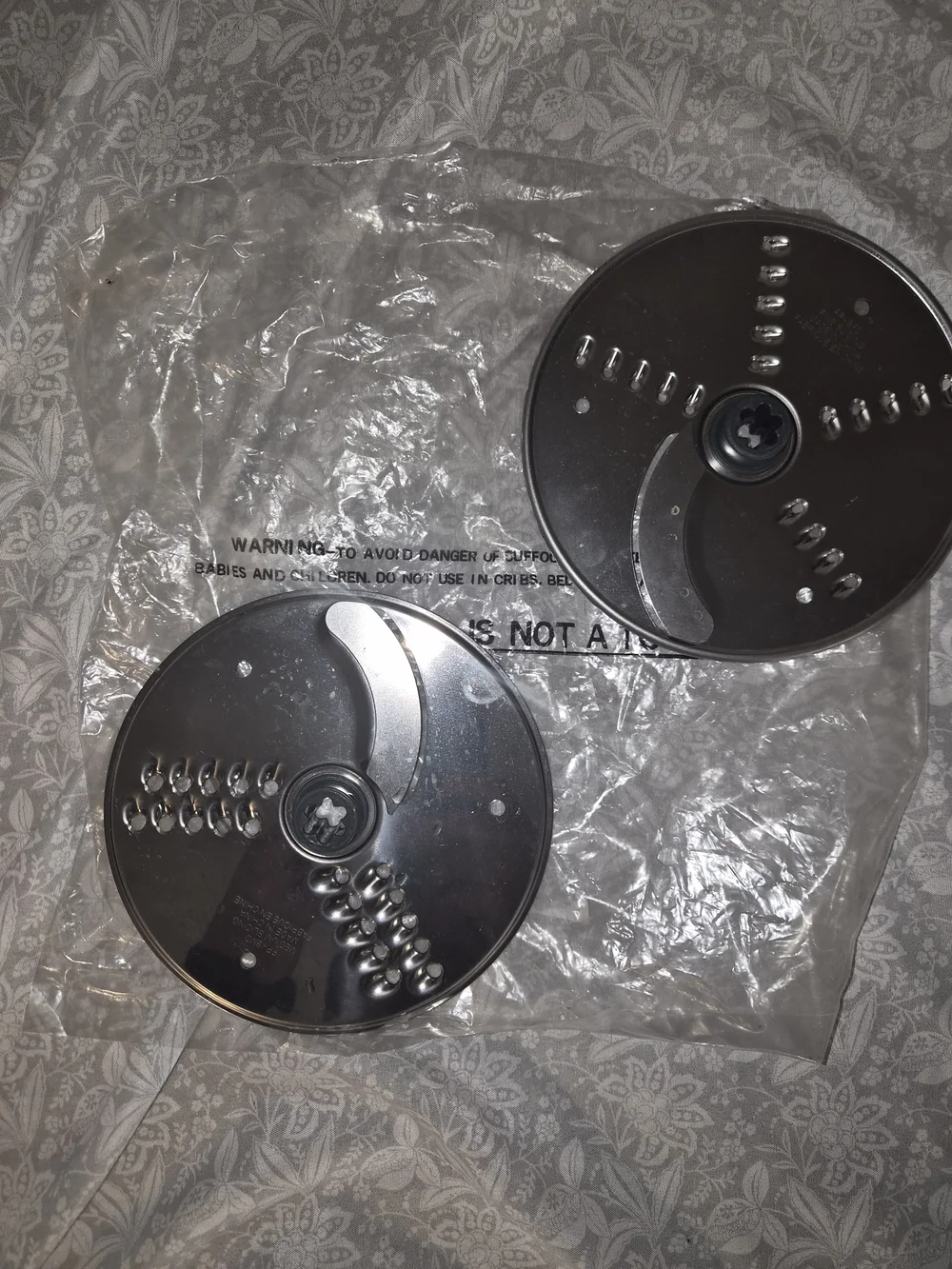 Cuisinart food processor fine slicing and shredding disc, model FP-8FD.